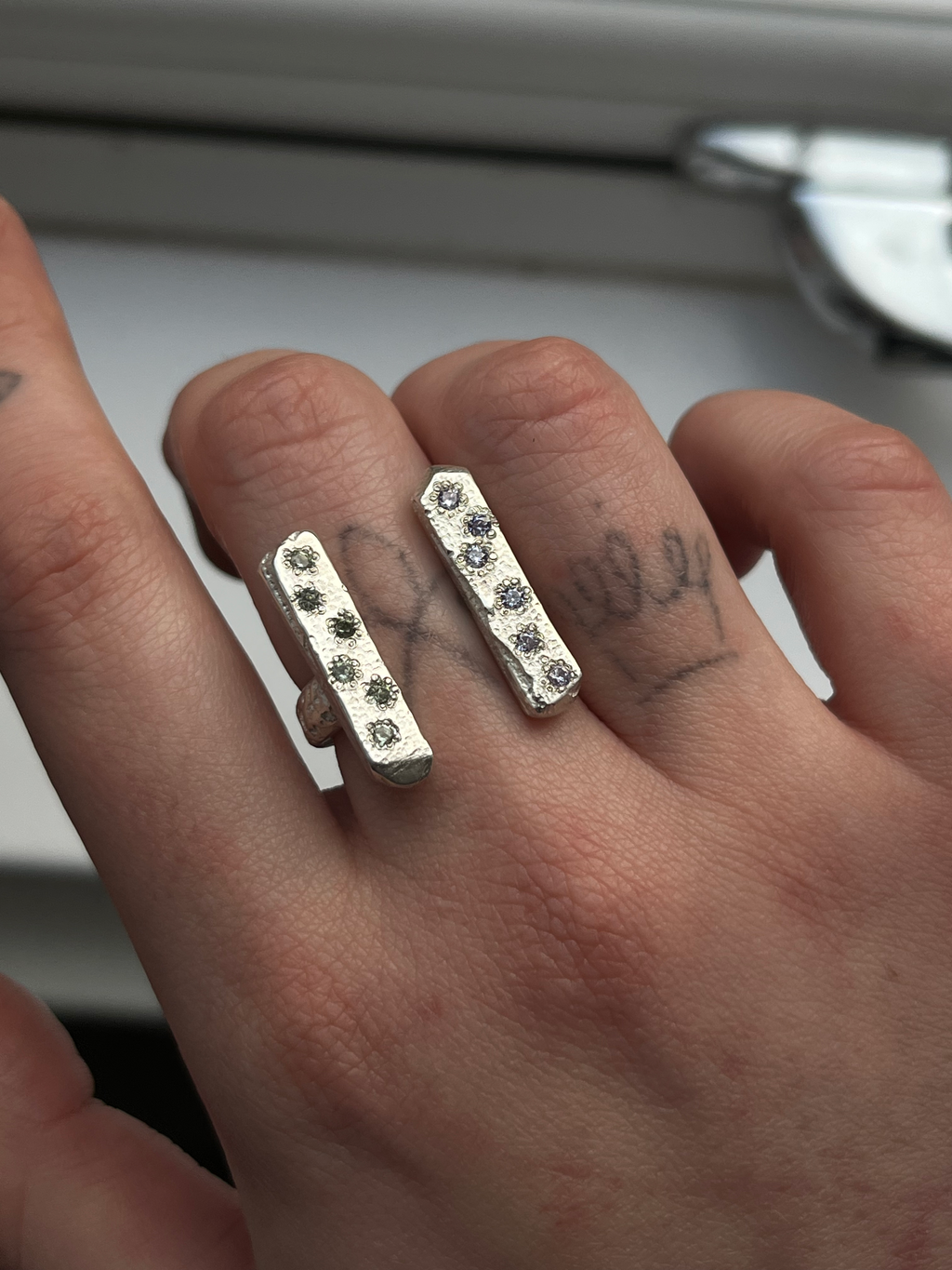 handmade silver ring on a hand
